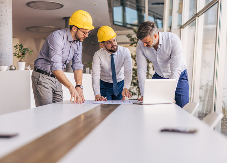 Professionals collaborating in modern office setting