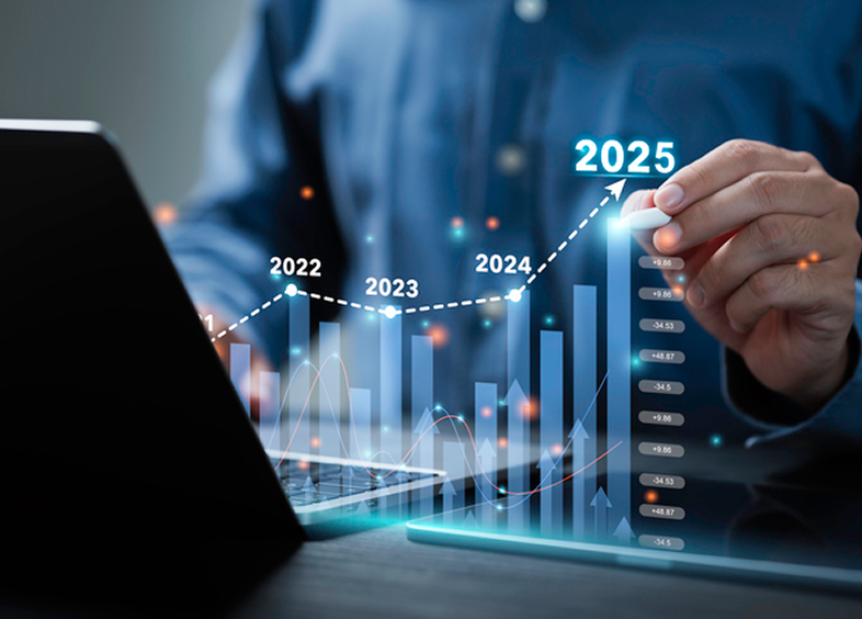 Hand pointing at rising financial graph
