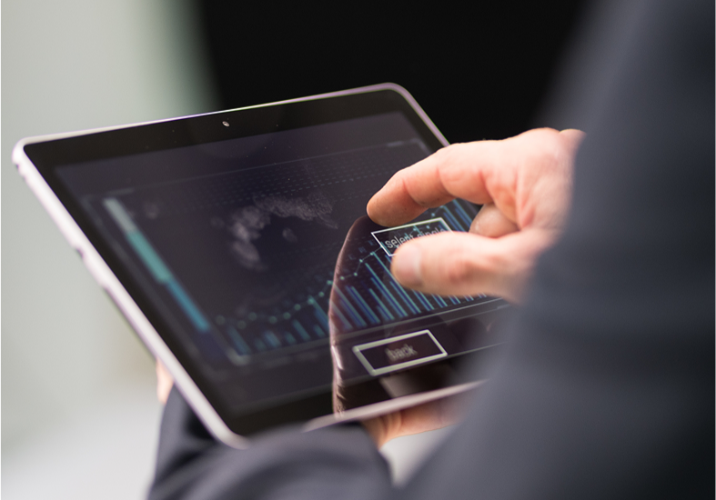 Touching tablet with financial data displayed